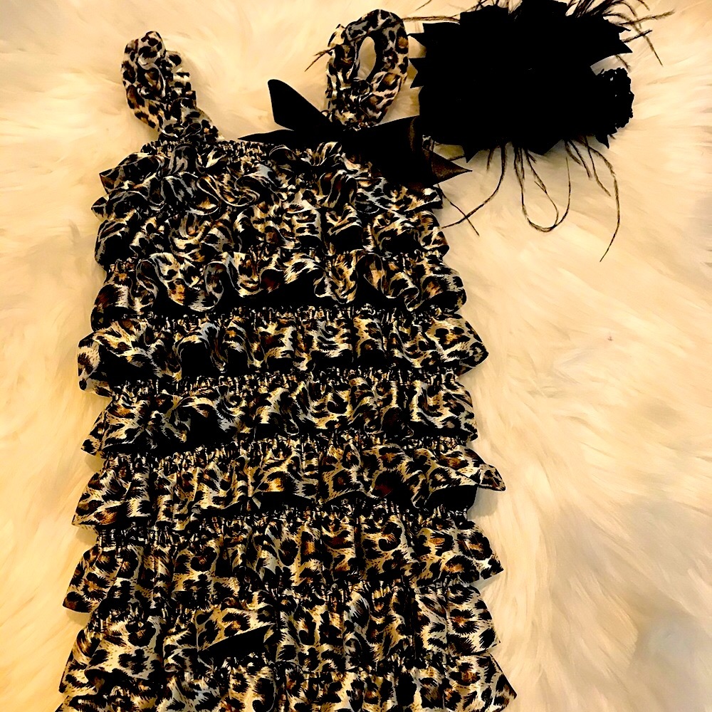 Leopard Satin romper plus over the top hair bow suitable for a child 18-24 month
